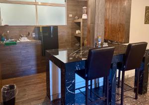 Kuchyň nebo kuchyňský kout v ubytování SUITE 4, Centro de Cuauhtemoc Chihuahua