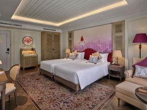 Postel nebo postele na pokoji v ubytování Mercure Dalat Resort