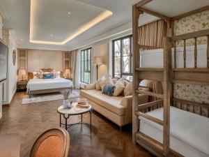 Postel nebo postele na pokoji v ubytování Mercure Dalat Resort + 126 fotografií