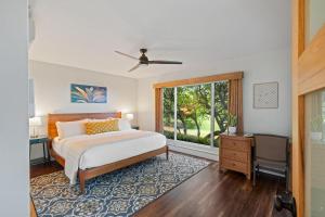a bedroom with a bed and a window at Kaanapali Plantation 34 · KPL 34 2BD Pool & Resort's Amenities, in Kahana +44 photos