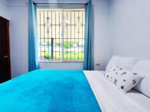 Ένα ή περισσότερα κρεβάτια σε δωμάτιο στο Santana Lux