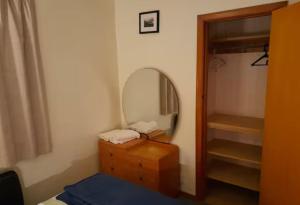 Ένα ή περισσότερα κρεβάτια σε δωμάτιο στο The Yellow Brick House