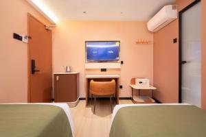 Μια τηλεόραση ή/και κέντρο ψυχαγωγίας στο A Hotel Farrer Park - Newly Renovated +36 φωτογραφίες