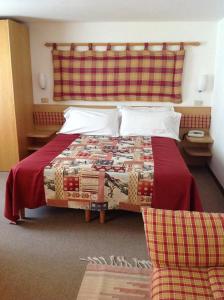 Voodi või voodid majutusasutuse B&B Monte Giove Formazza toas