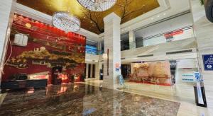 Ο χώρος του λόμπι ή της ρεσεψιόν στο Southeast Peninsula Hotel Quanzhou
