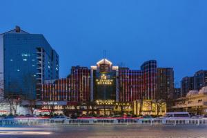 a view of a city skyline with tall buildings at Jinjiang Metropolo Zhengzhou Songshan Road in Zhengzhou
