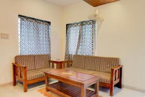 Posezení v ubytování Super Collection O Khatri Park Formerly Aum Villa