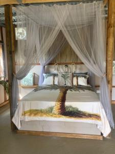 Ένα ή περισσότερα κρεβάτια σε δωμάτιο στο Emelios Lodge +36 φωτογραφίες