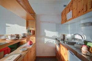 Kuchyň nebo kuchyňský kout v ubytování La Casa Di Mitti - Happy Rentals + 10 fotografií