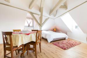 Giường trong phòng chung tại Les Appartements Saint Nicolas
