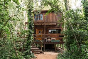 a tree house in the middle of the woods at Cabañas en el Bosque a 5 minutos del mar - Estancia CH in Punta del Este