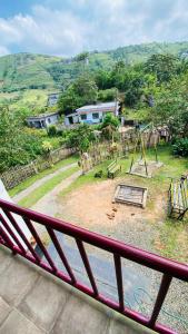 a view of a playground from a balcony at Nirvikalpa in Vagamon