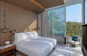 Postel nebo postele na pokoji v ubytování InterContinental Ras Al Khaimah Mina Al Arab Resort & Spa by IHG