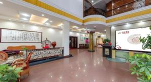 Ο χώρος του λόμπι ή της ρεσεψιόν στο Shell Hotel Zhejiang Cixi Longshan Town