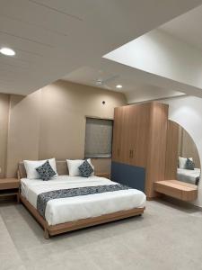 Ένα ή περισσότερα κρεβάτια σε δωμάτιο στο Hotel Sun Shine