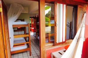 Postel nebo postele na pokoji v ubytování Novos Baianos Hostel e Pousada + 79 fotografií