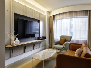 TV a/nebo společenská místnost v ubytování The Porter House Hotel Sydney - MGallery + 188 fotografií