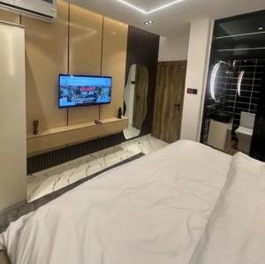 Postel nebo postele na pokoji v ubytování Hometime wuse ll