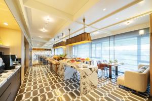 Χώρος καθιστικού στο Grand Mercure Guangzhou Baiyun