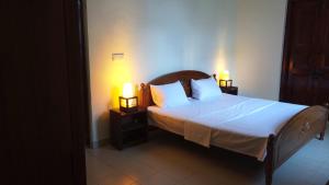 Postel nebo postele na pokoji v ubytování Pearl of Kandy + 7 fotografií