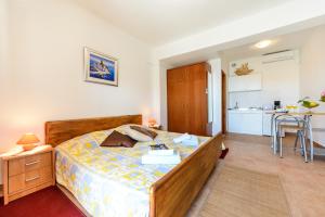 Postel nebo postele na pokoji v ubytování Fisherman's Guest house Galeb