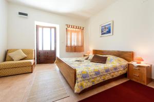 Postel nebo postele na pokoji v ubytování Fisherman's Guest house Galeb