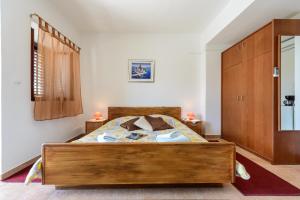 Postel nebo postele na pokoji v ubytování Fisherman's Guest house Galeb