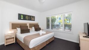 Ένα ή περισσότερα κρεβάτια σε δωμάτιο στο Oaks Pacific Blue Pool spa more in complex +17 φωτογραφίες