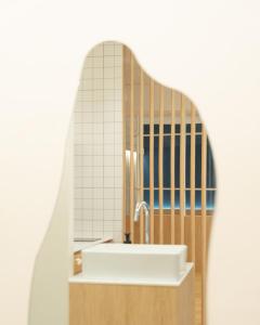 Ένα μπάνιο στο 부사노바