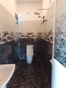 Ένα μπάνιο στο Ceylon Green Gate Hotel