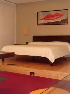 A bed or beds in a room at Hotel Ristorante al Gabbiano