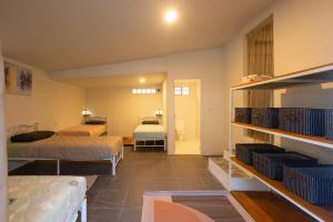 Postel nebo postele na pokoji v ubytování Via del Mare Residence + 62 fotografií