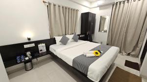 Ένα ή περισσότερα κρεβάτια σε δωμάτιο στο Basil Inn +12 φωτογραφίες