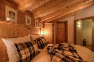 Posteľ alebo postele v izbe v ubytovaní Logenplatz Zillertal