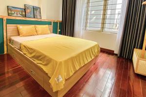 Postel nebo postele na pokoji v ubytování Paperi House - next to night market