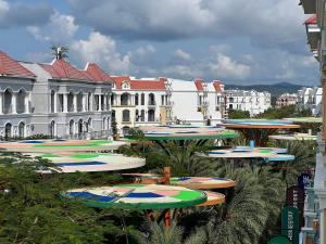 a bunch of surfboards are lined up in front of buildings at Sua Chua in Phú Quốc