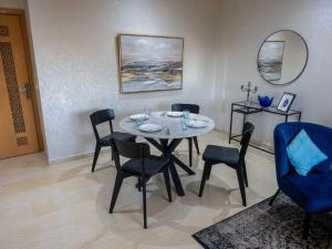 Posezení v ubytování Appartement Luxueux, 2 chambres, à 300m de la Gare de train