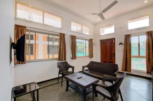 TV a/nebo společenská místnost v ubytování Paradise Auro Jungle Resort + 8 fotografií