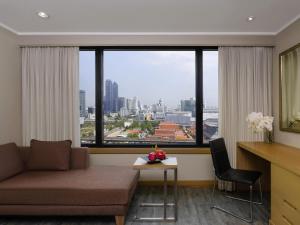 Posezení v ubytování Grand Mercure Bangkok Atrium