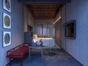 Un lugar para sentarse en Siya Jasmine Oriental Courtyard Cultural Theme Hotel