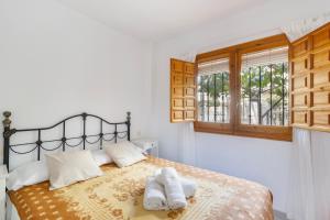 Postel nebo postele na pokoji v ubytování Moreras + 12 fotografií