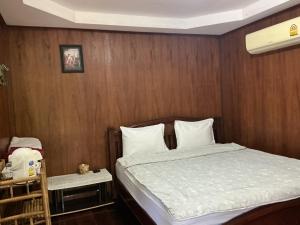 Postel nebo postele na pokoji v ubytování Pruksa Resort Prachin Buri