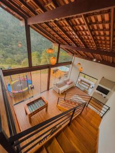 an overhead view of a living room and dining room at Casa 3 Quartos Recanto Buritis in Santa Teresa