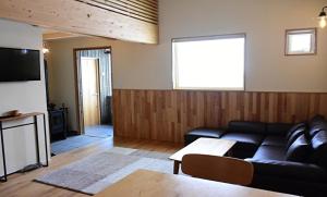 TV a/nebo společenská místnost v ubytování mizuki natural villa Garden