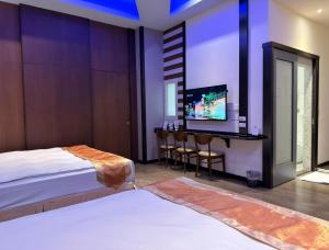 TV/trung tâm giải trí tại Wei Feng Exquisite Motel Pintung Branch