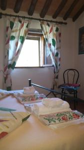 A bed or beds in a room at Appartamento Martina