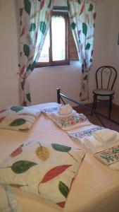 A bed or beds in a room at Appartamento Martina
