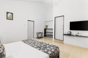 Μια τηλεόραση ή/και κέντρο ψυχαγωγίας στο 8fold by Larisa, Siolim