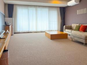 TV a/nebo společenská místnost v ubytování GLOBAL RESORT NUKUI + 100 fotografií