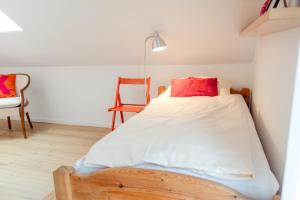 Ένα ή περισσότερα κρεβάτια σε δωμάτιο στο Ferienwohnung Kleine Auszeit